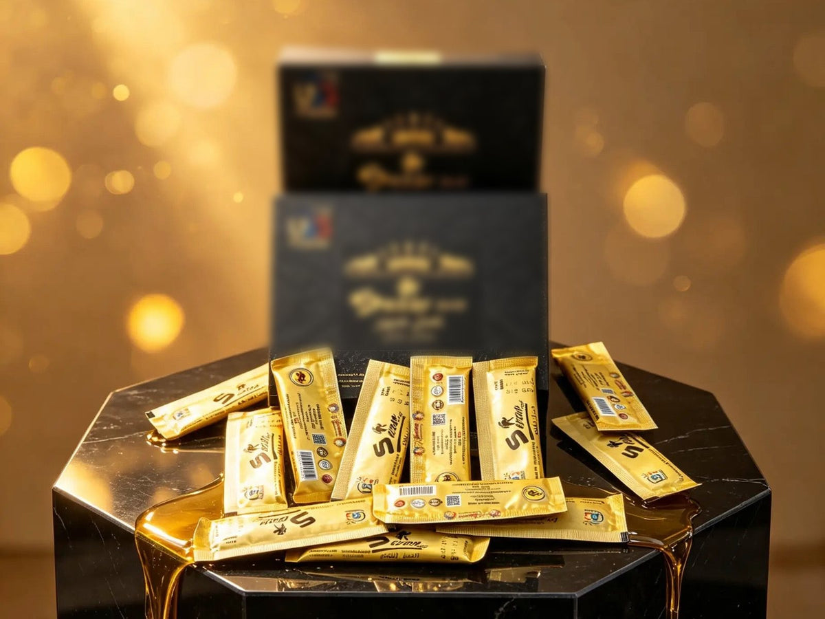 Gold Sezar honey sachets on a black marble stand with honey dripping, warm golden light